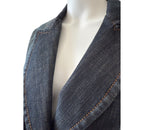Escada Sport tailored dark wash denim blazer with notch lapels, logo button closure, flap pockets, and contrast stitching.