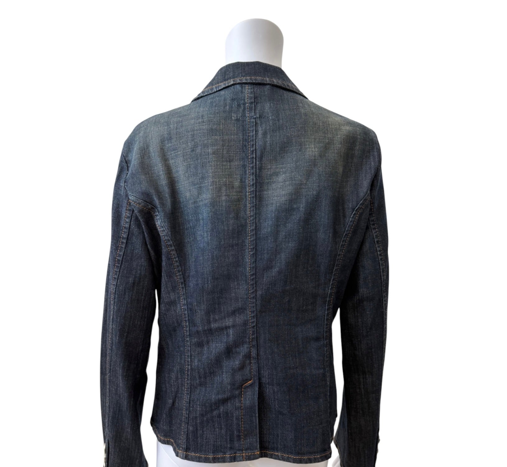 Escada Sport tailored dark wash denim blazer with notch lapels, logo button closure, flap pockets, and contrast stitching.