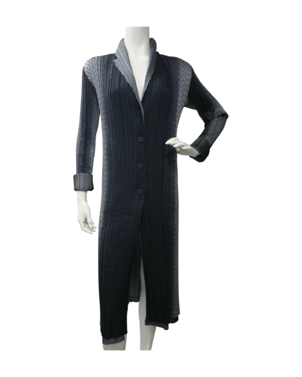 Issey Miyake Pleats Please reversible long pleated coat in gray charcoal and black with notched lapel and button-front closure.