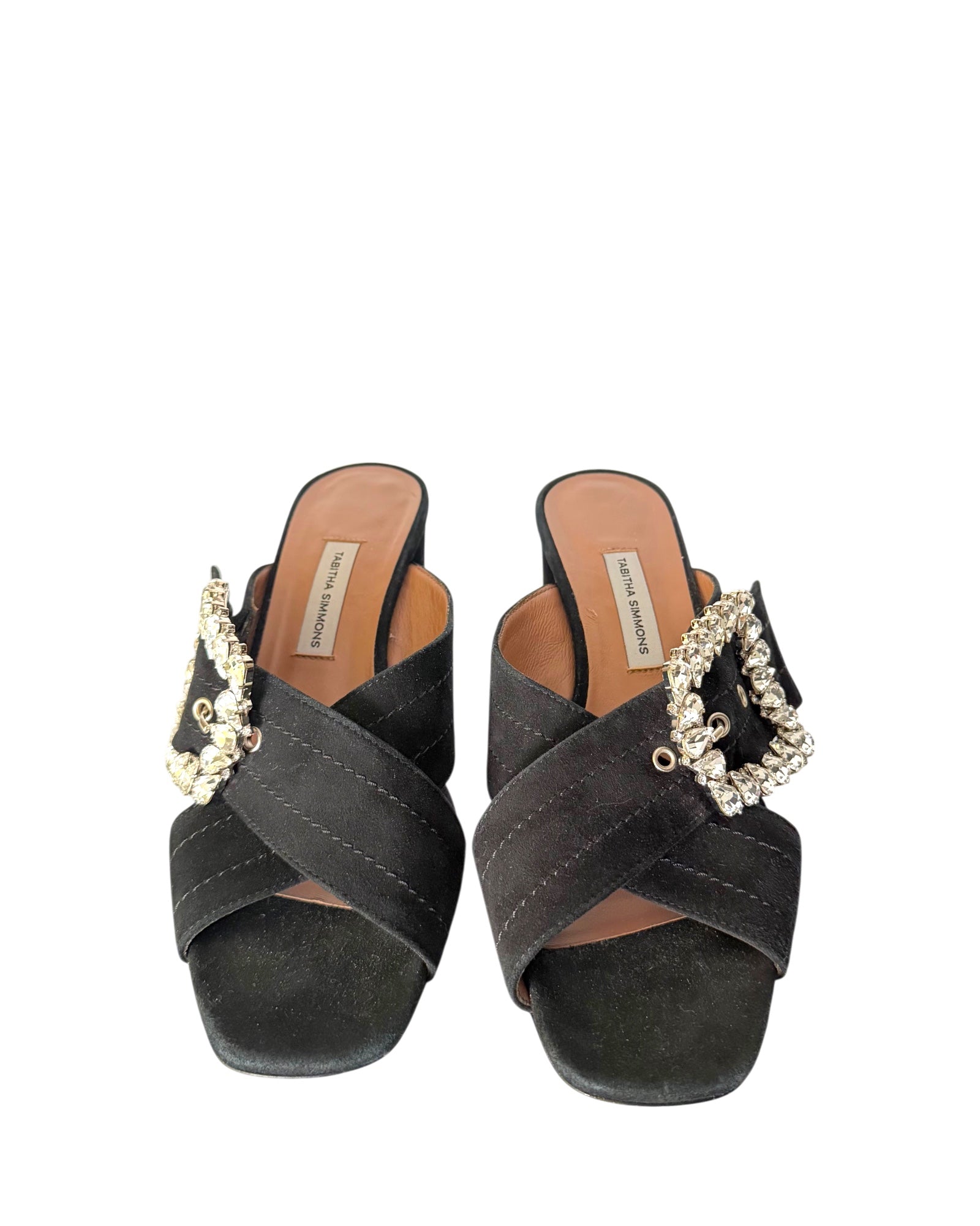 Tabitha Simmons black suede slide sandals with crystal-embellished buckle, crossover straps, square toe, and slip-on mule silhouette.