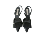 Stella McCartney black satin slingback pumps with oversized bow detail, pointed toe, and elegant evening silhouette